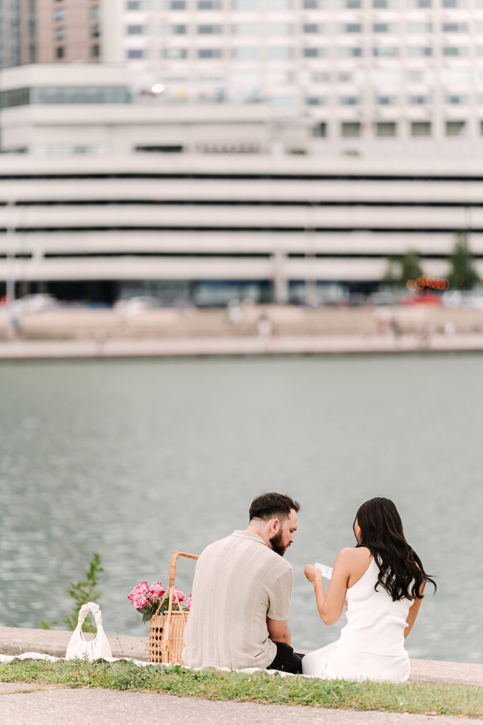 moments before a proposal at Milton Lee Olive Park