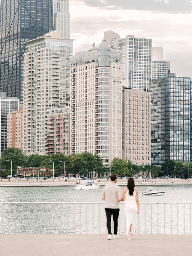 Engagement portraits at Olive Park with the northern Chicago skyline