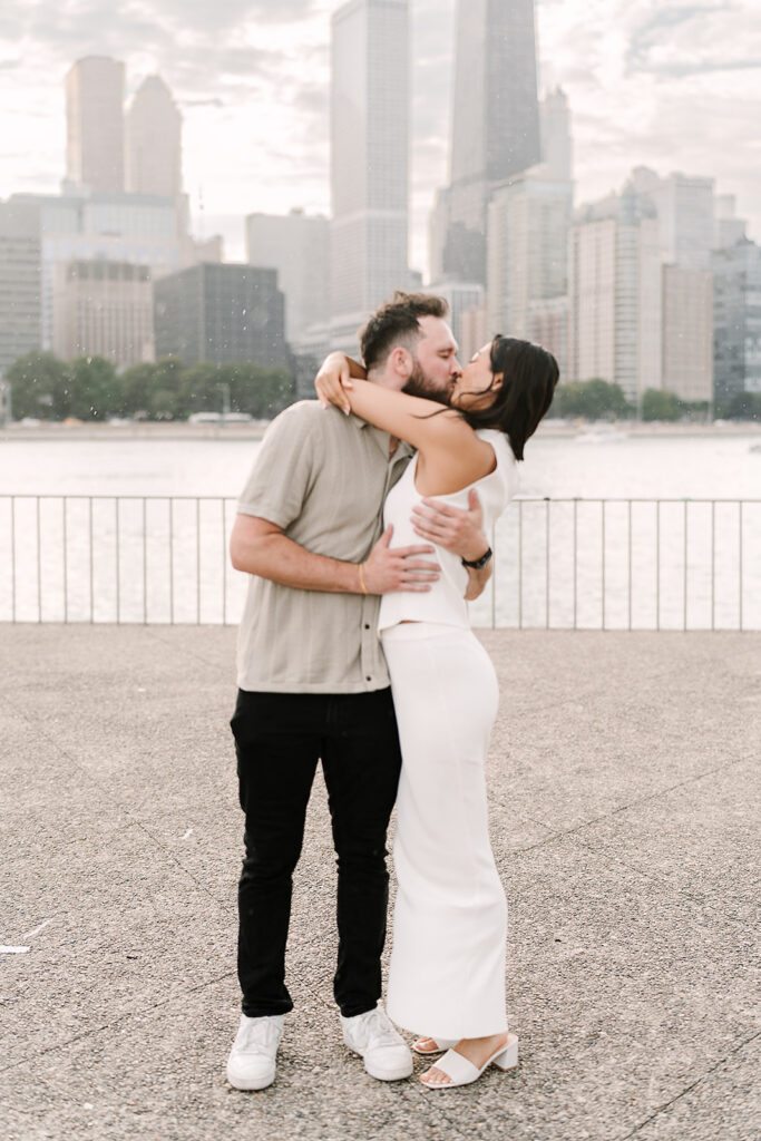 Newly engaged couple embracing in Chicago