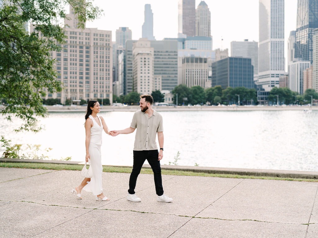 Couple walking the lakefront at Milton Lee Olive Park