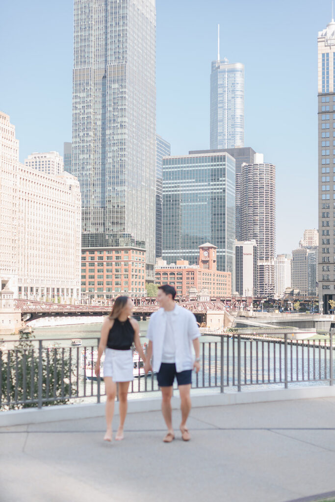 Engagement portraits along the Chicago River at River Point Park